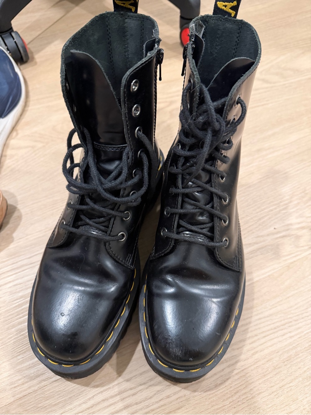Dr. Martens Black Leather Combat Boots with Yellow Stitching